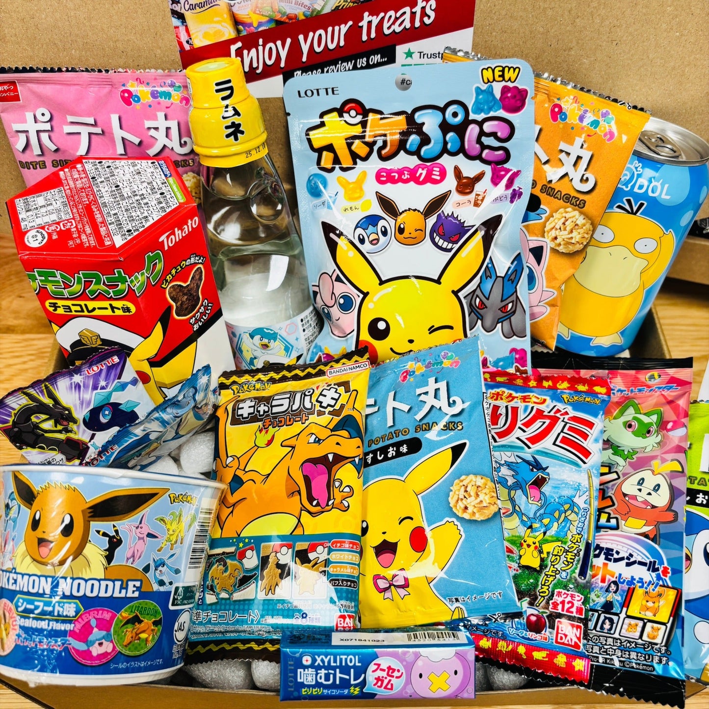 Pokémon themed Japanese snack box with sweets, gummies and drinks assortment